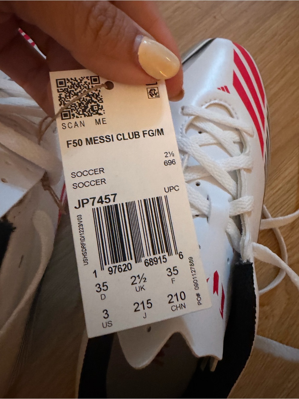 adidas Kids Soccer Shoes in White with Red Accents